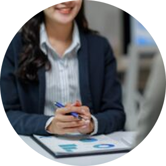 Businesswoman holding pen and document folder.